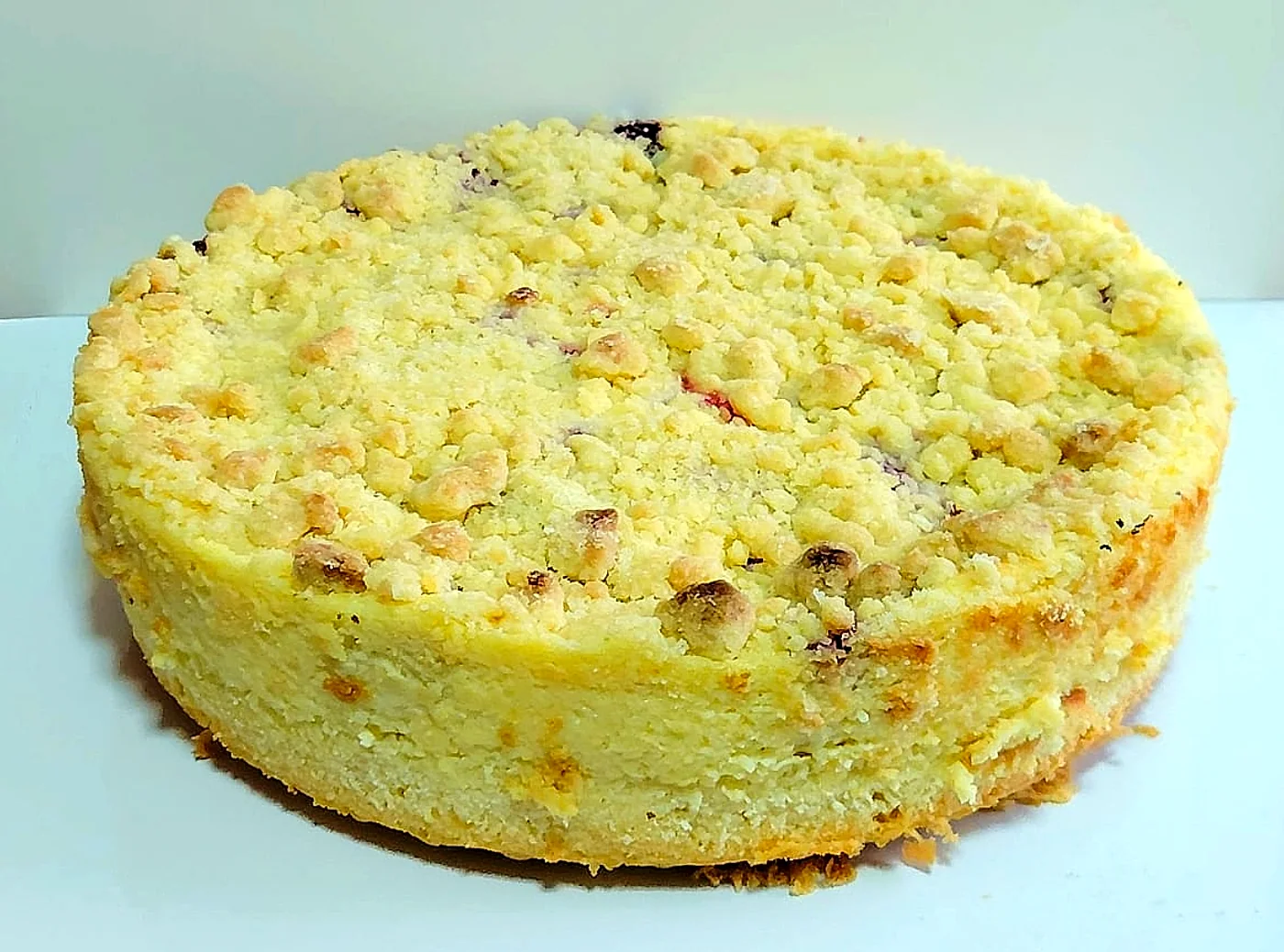Kuchen con crumble dorado
